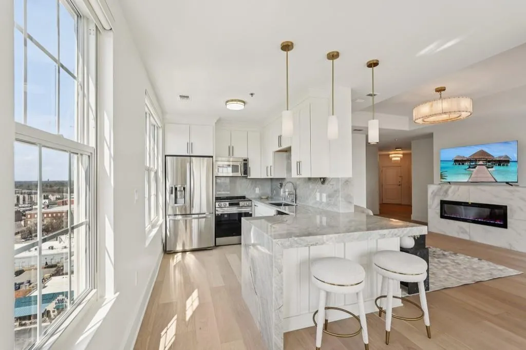 Chef's Kitchen With Natural Mystic Blue Quartzite Counters, Custom Cabinetry, & Amazing Views!