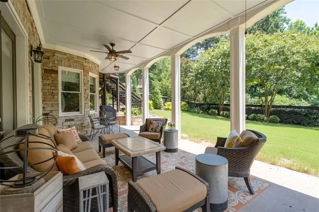 Large covered patio overlooking the backayrd