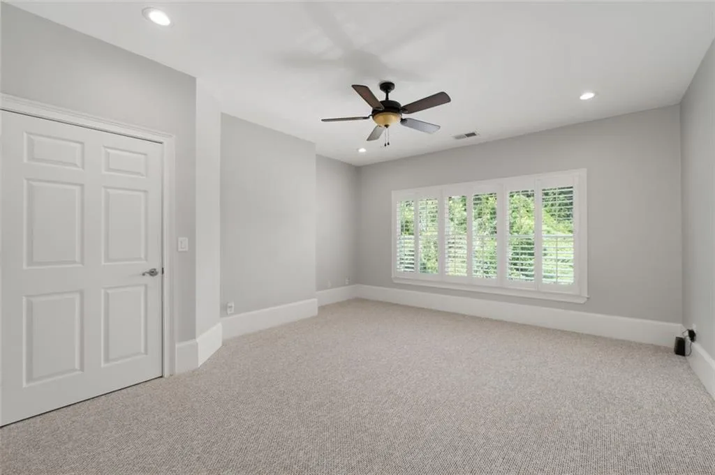 Guest bedroom 2 w/ walk-in closet & ensuite bath