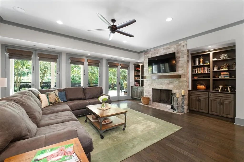 Spacious living room with fireplace & built-ins in the terrace level
