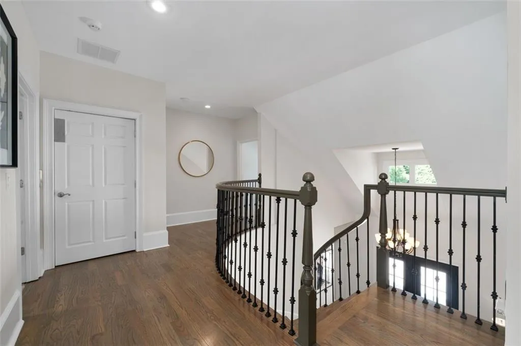 Upstairs landing & hallway with hardwood floors