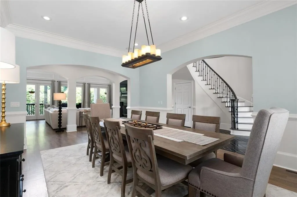 Large dining room with arched entry ways