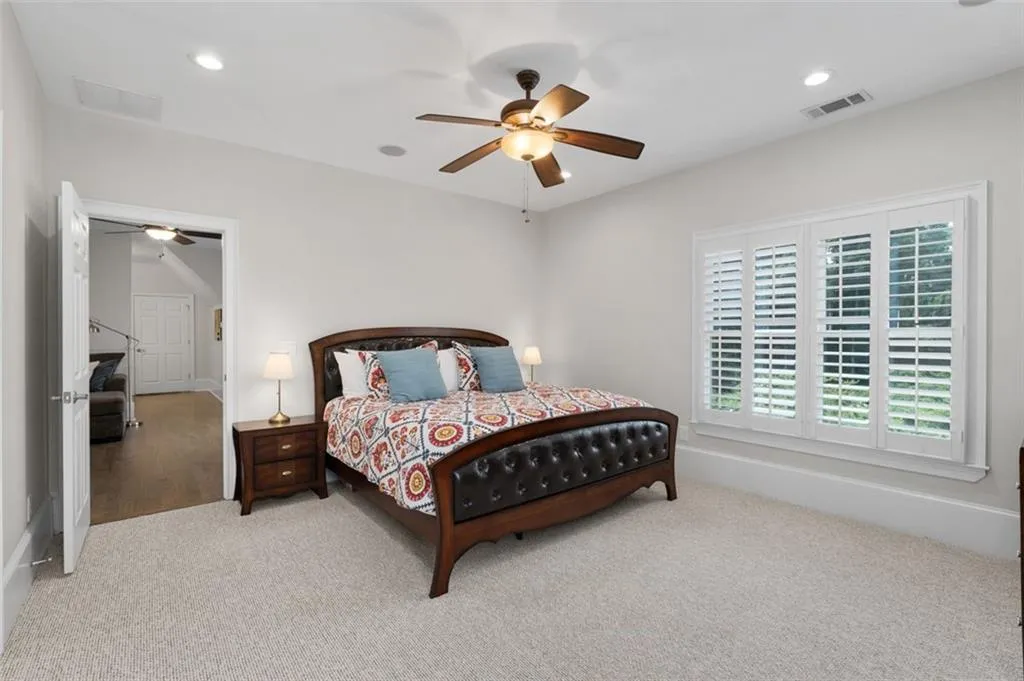 Spacious bedroom in the in-law suite has a walk-in closet