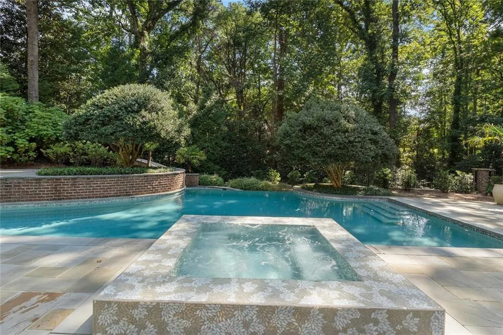 Main level pool and entertaining off of living room and family room.