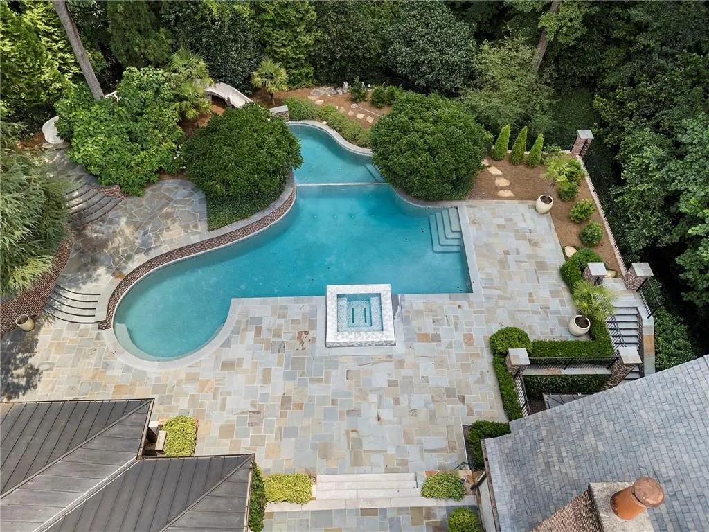 Bluestone patio deck, double pool with spa.