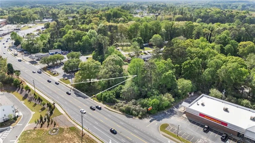 Drone / aerial view of a heavily wooded area