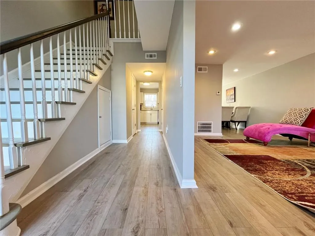 Foyer entrance featuring light wood-type flooring and recessed lighting