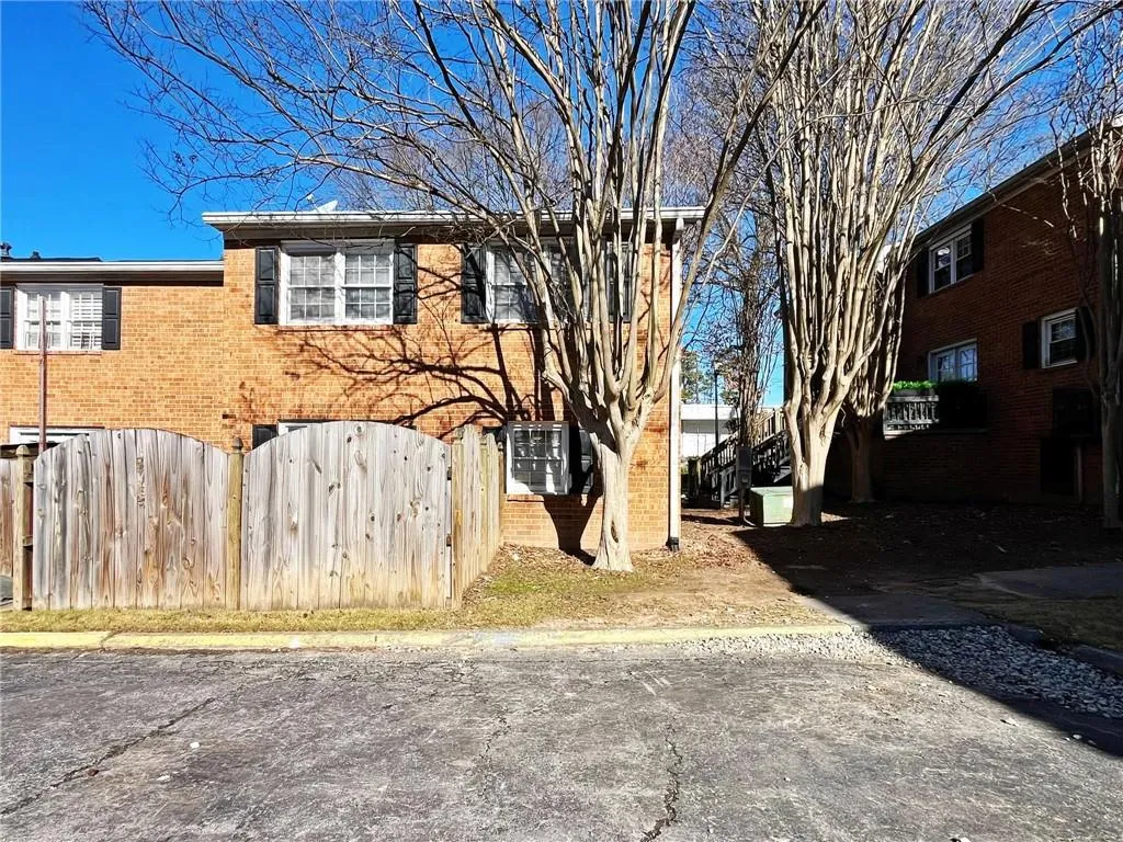 View of front facade featuring brick siding