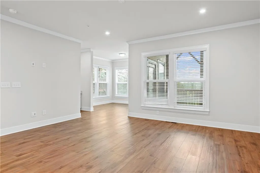Large gathering room, with sunroom, and deck with spectacular city views