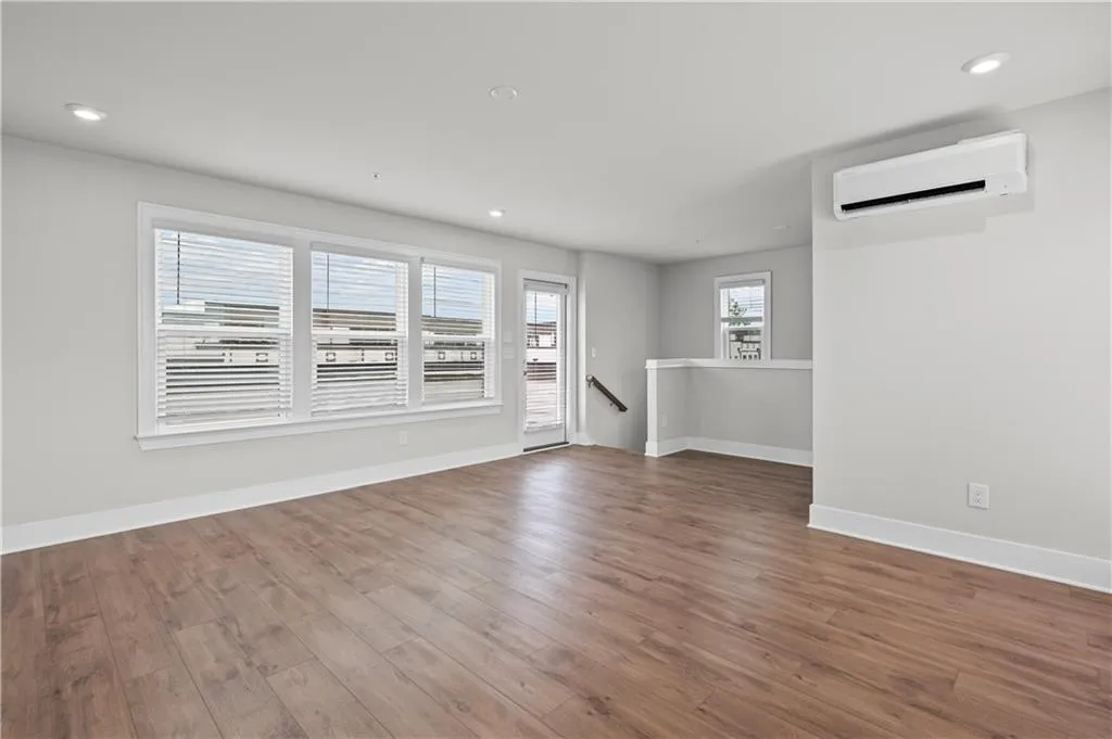 4th Floor Loft with half bath, has both front/rear decks with unobstructed Atlanta skyline views
