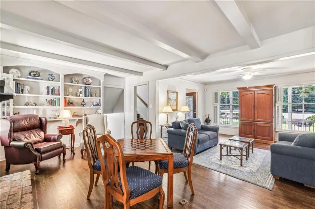 Separate den and living rooms were opened to one another to create one large living area