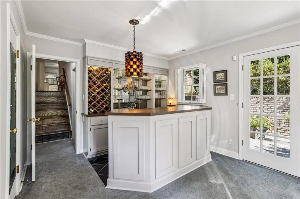 Custom wet bar with built-in refrigerator and icemaker