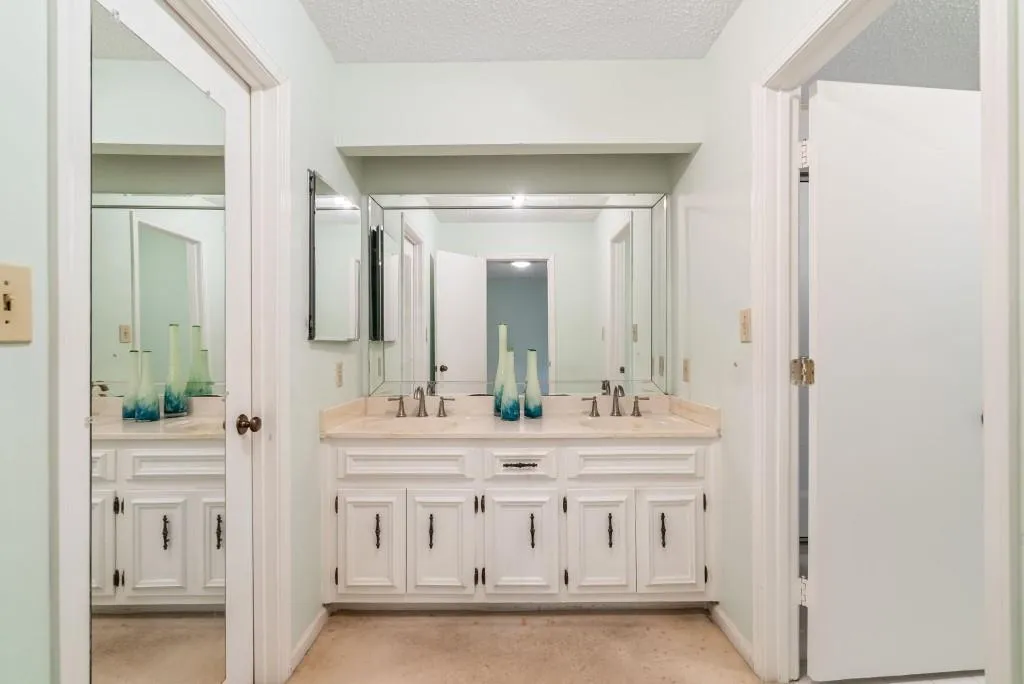 Primary Suite Bathroom Offers Dual Vanities AND Dual Closets!