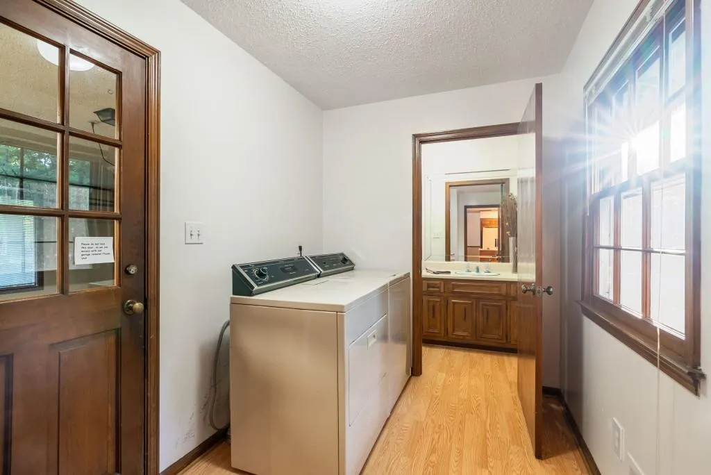 To The Left Is A 2-Car Garage With Bonus Storage And In Front Is Guest Powder Room, All Off Kitchen!