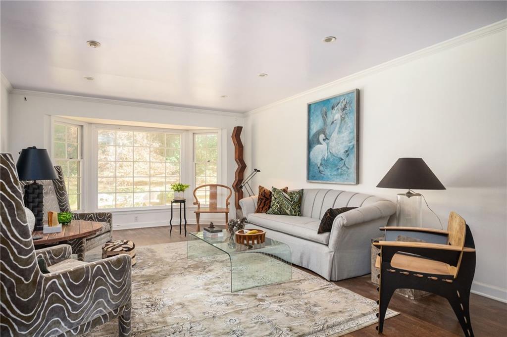 Living room featuring large window to garden.