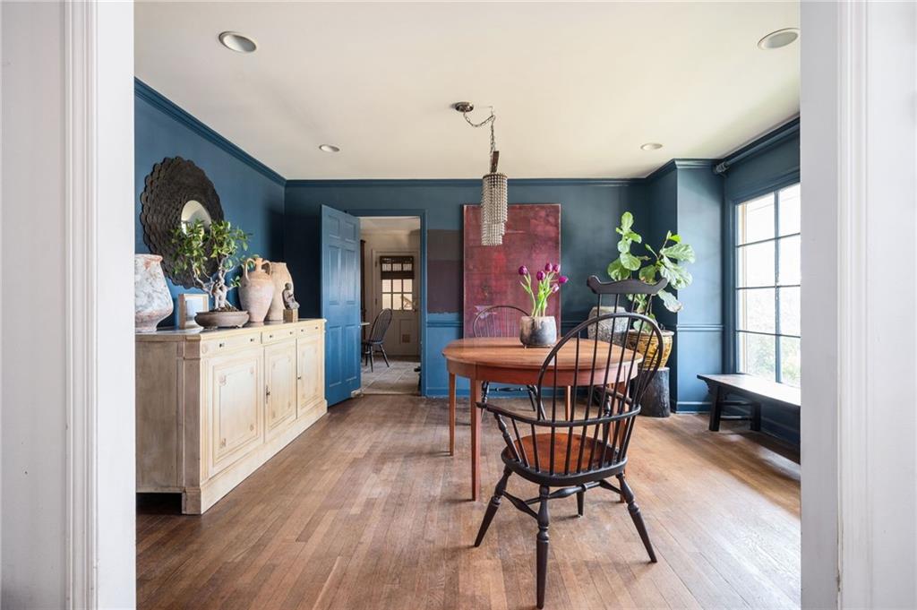 Dining area with wood flooring