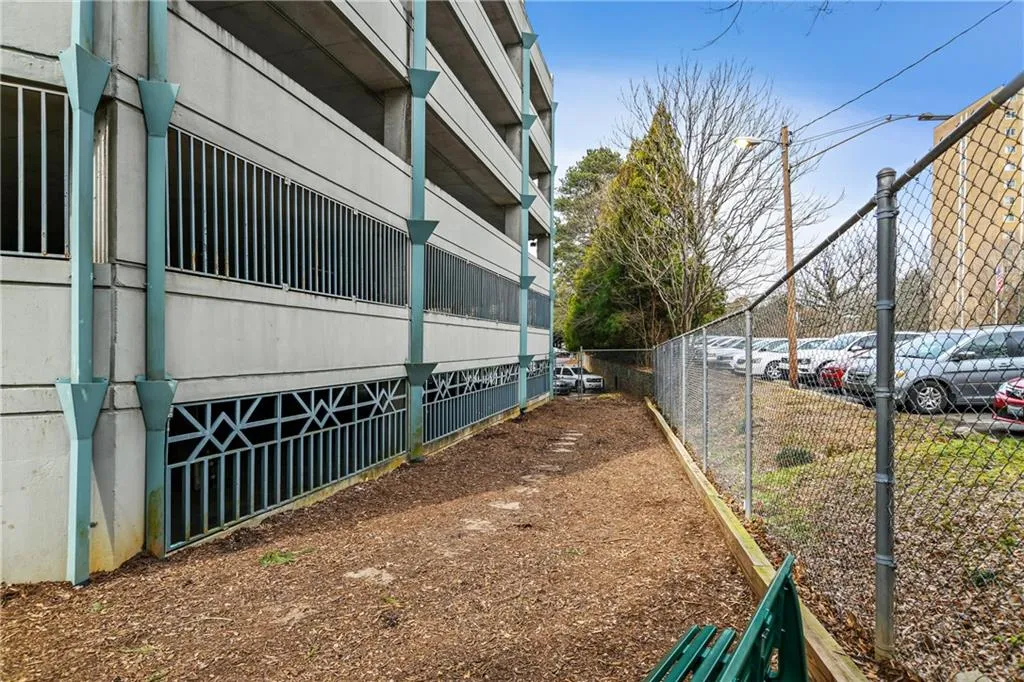 View of side of property with fence