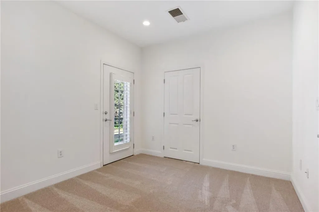 View of carpeted entrance foyer