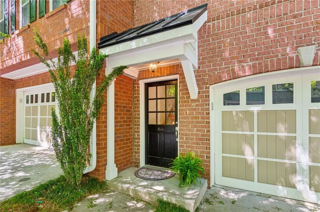 Property entrance featuring a garage