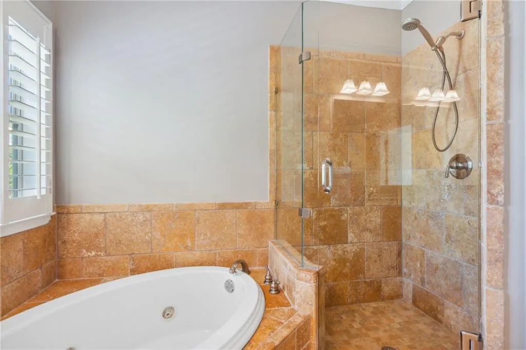 Bathroom with separate shower and tub