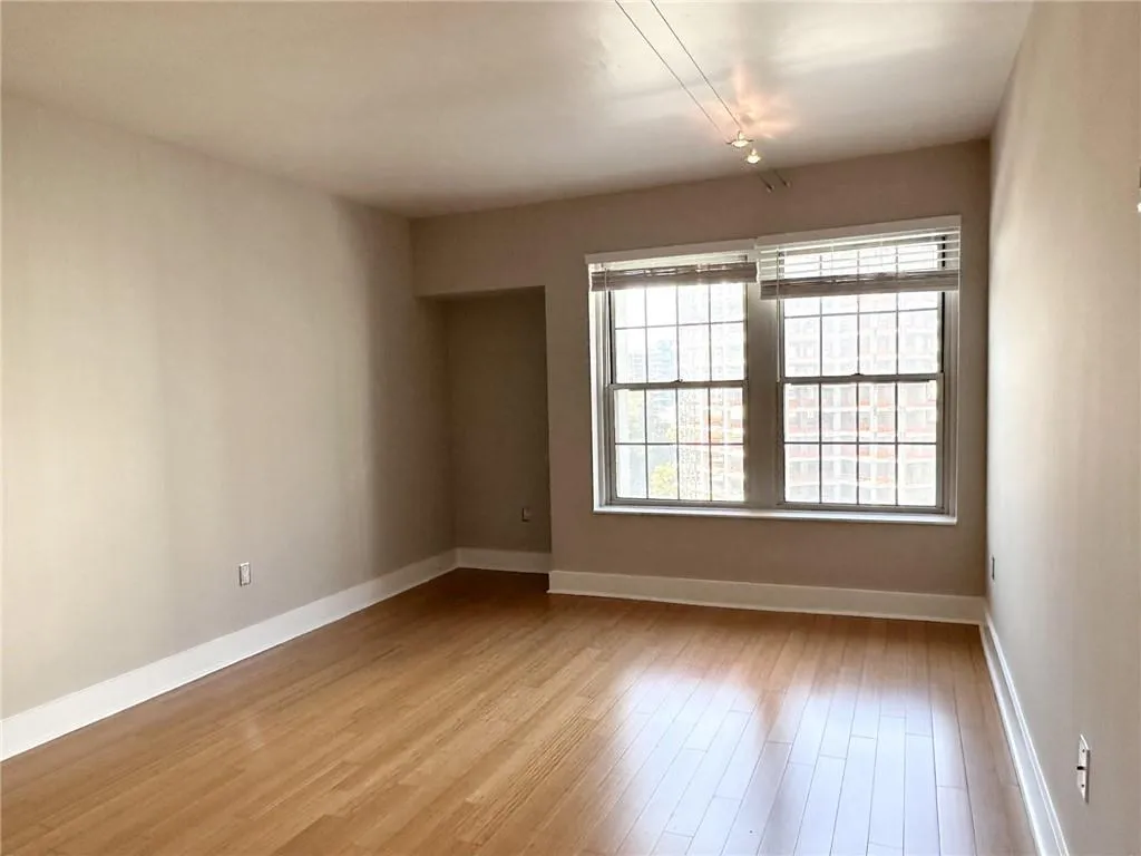 Spare room featuring light wood finished floors