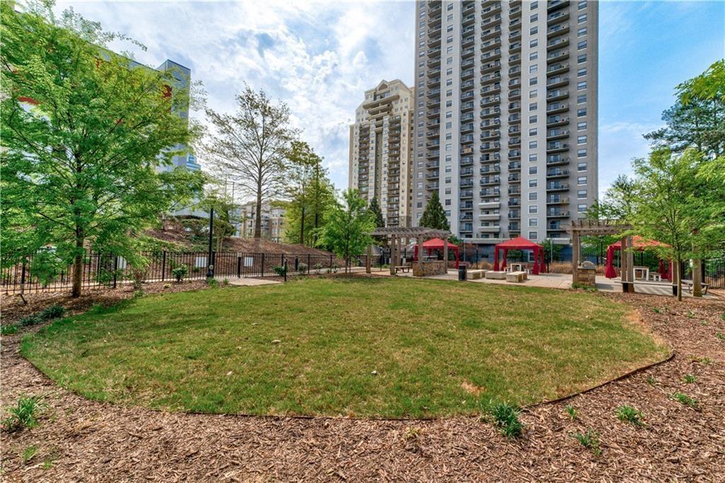 Surrounding community featuring a lawn