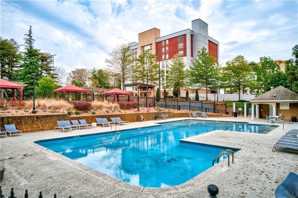 View of swimming pool featuring a patio