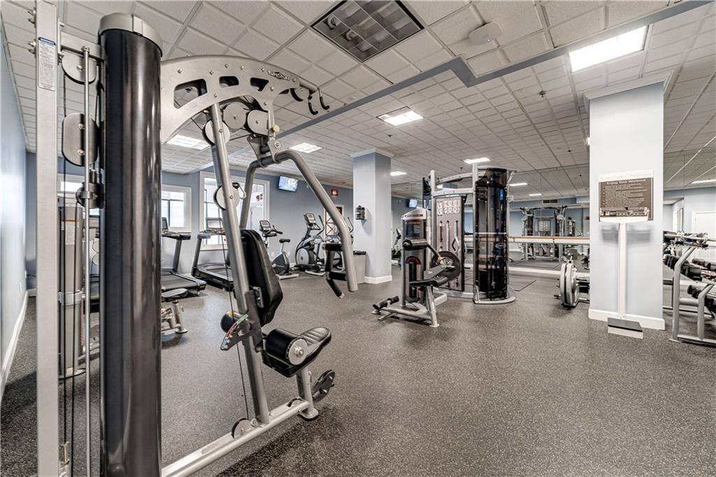 Gym featuring a drop ceiling