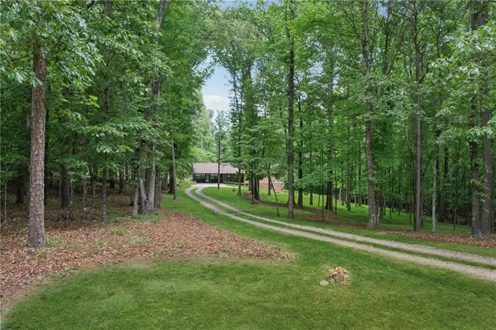 View of community with a yard