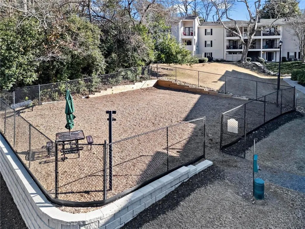 View of community with a dog friendly area