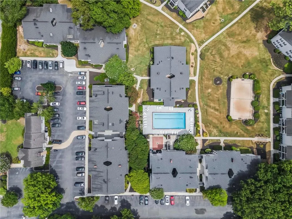 Aerial overview of property's location with a pool area