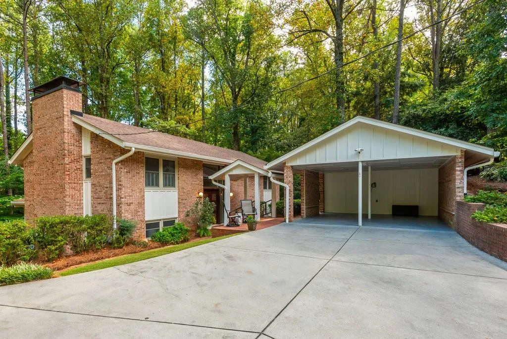 View of front of home featuring a carport