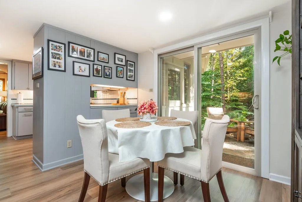 Dining area with light wood-type flooring
