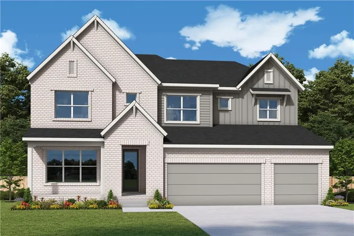 Two-story residence featuring light-colored brick and gray vertical siding