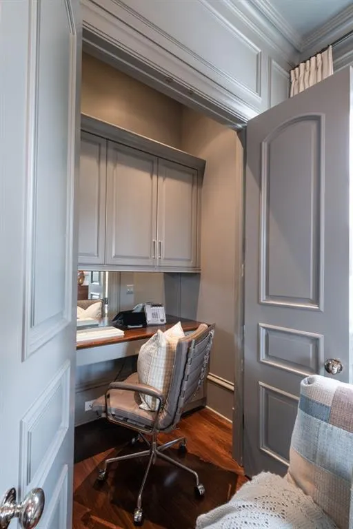Hidden office behind French doors in the library