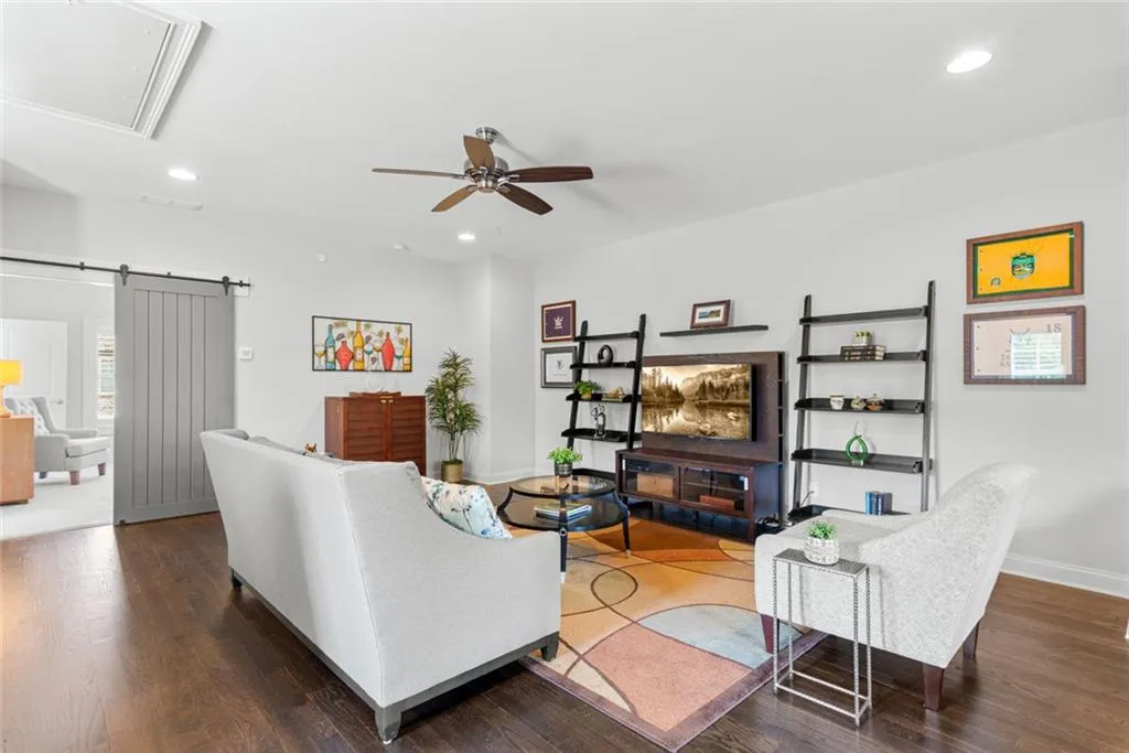 Upper Level _ Second Area opens to covered porch with fireplace
