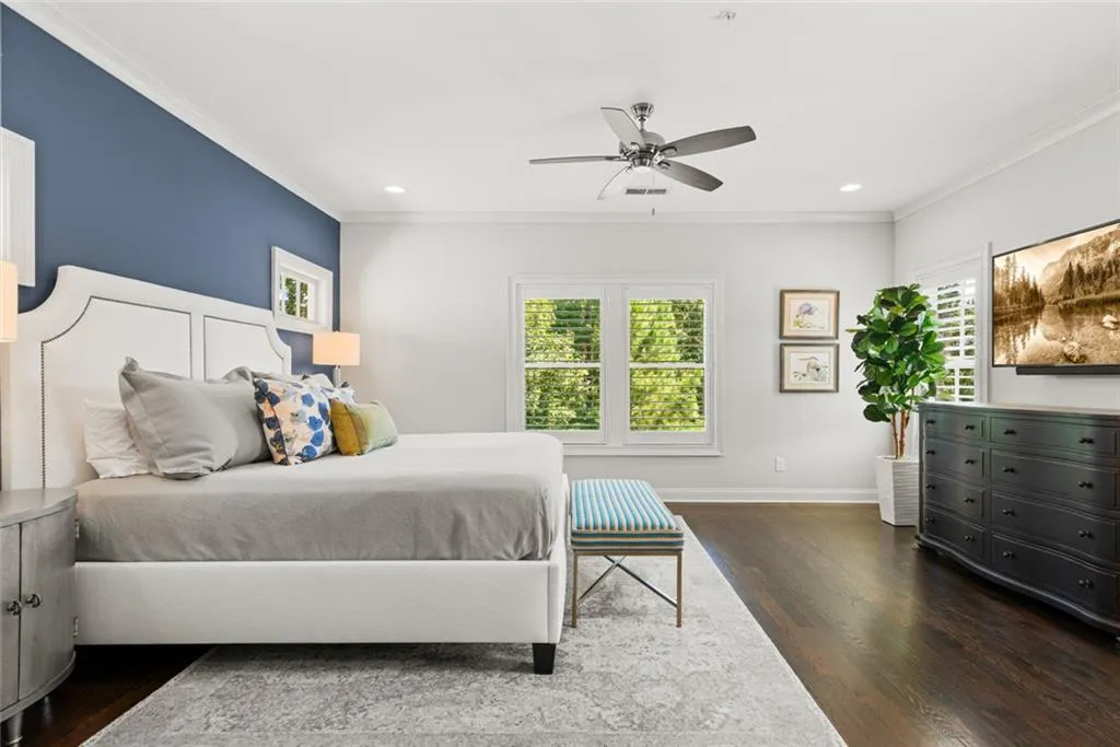 Primary _ Elegant and expansive, this owner’s suite blends comfort, style, and functionality in one seamless retreat