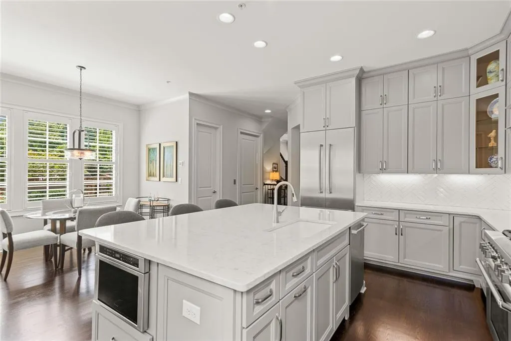 Sophistication and livability combine - large Island and open concept encourage  gatherings w family and friends