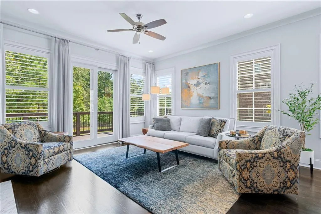 Family Room _ custom drapes and plantation shutters throughout