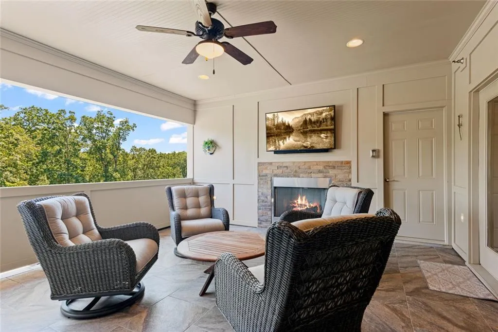 Upper Level _Covered Porch with stone fireplace _ your view will never change _ protected greenspace _ chattahoocee and cochran shoals trails