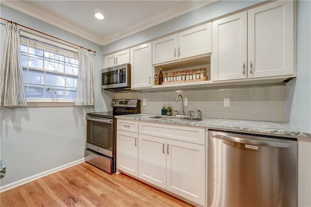 Kitchen with stainless steel appliances and granite countertops