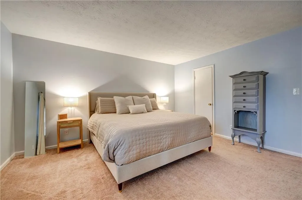 Primary bedroom with walk in closet