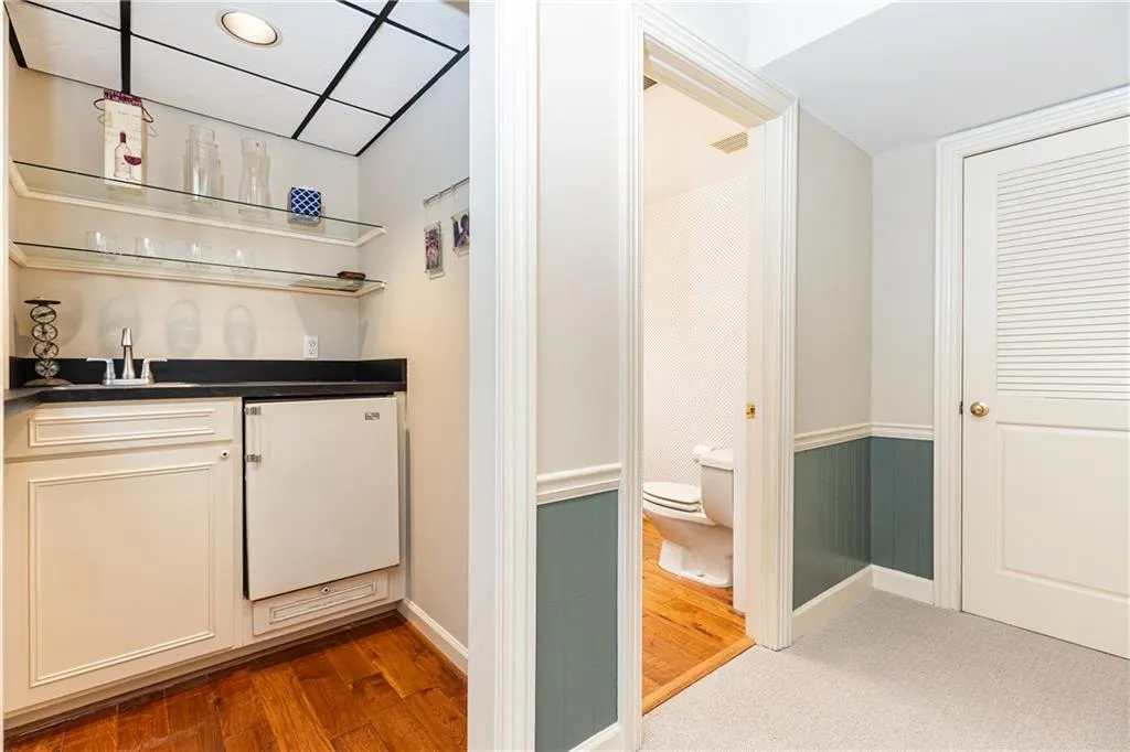 Enjoy a terrace level wet bar and  half bath for added conveninece.