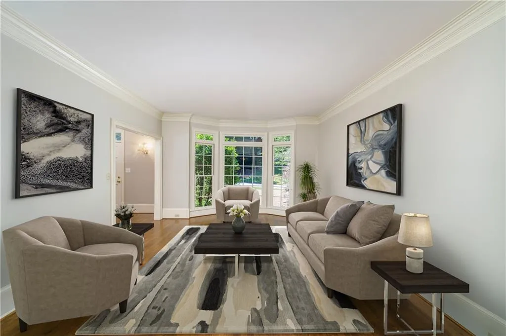 Living room is open to the dining room and perfect for entertaining (virtually staged) Living room is open to the dining room and perfect for entertaining (virtually staged)