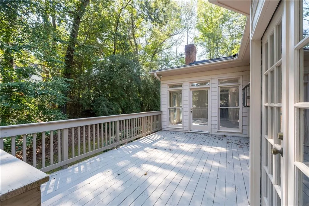 Huge deck overlooks private yard Huge deck overlooks private yard