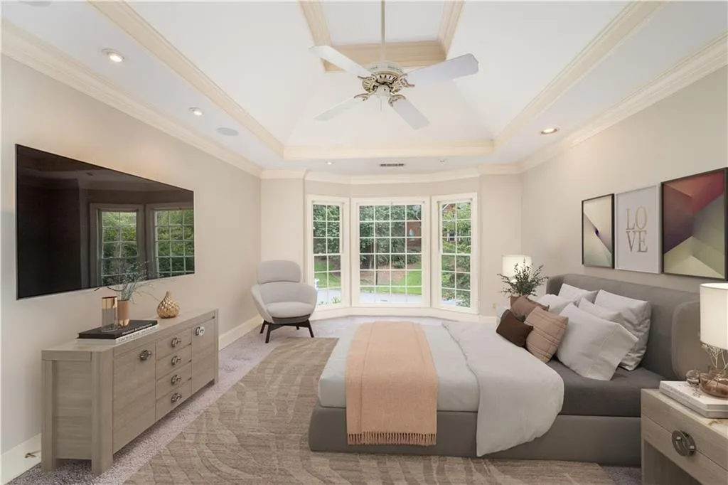 King size primary bedroom with tray ceiling and new carpet (virtually staged) King size primary bedroom with tray ceiling and new carpet (virtually staged)