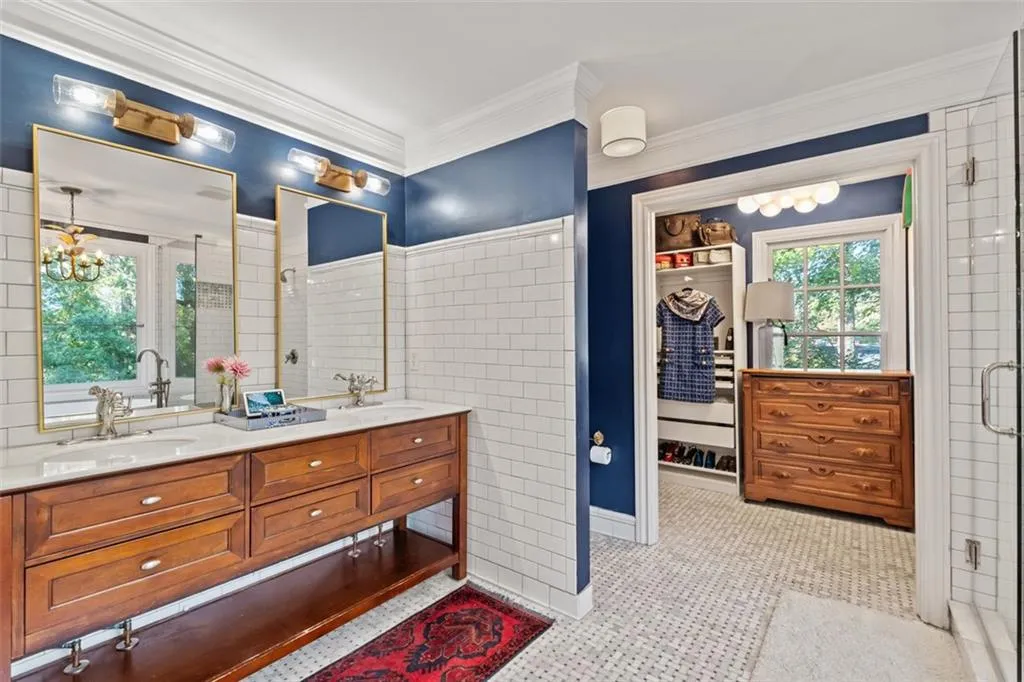 Ensuite bath features double vanity