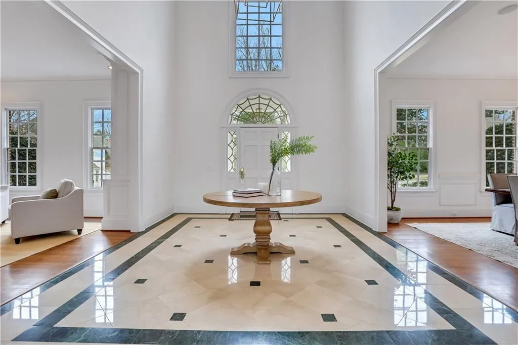 Gorgeous marble foyer in 2 story entry