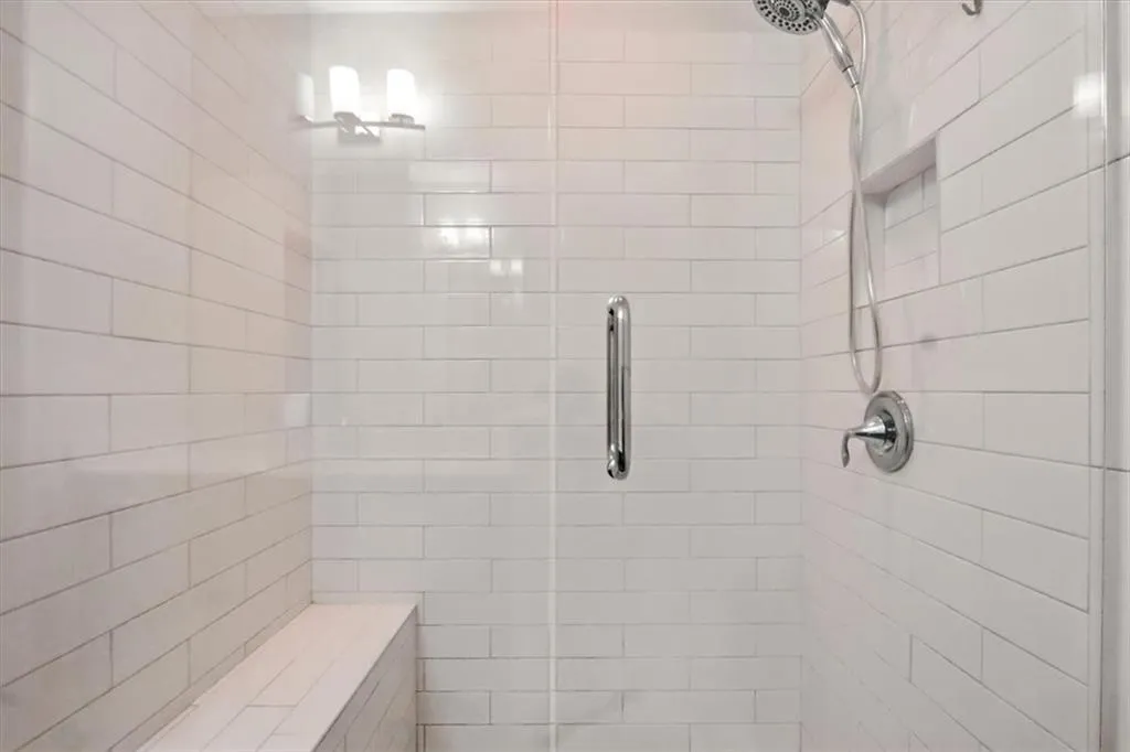 Bathroom featuring a stall shower Bathroom featuring a stall shower