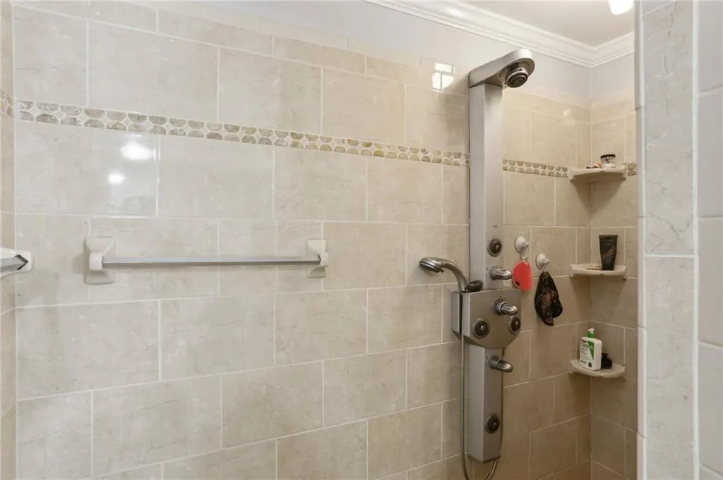 Bathroom featuring ornamental molding